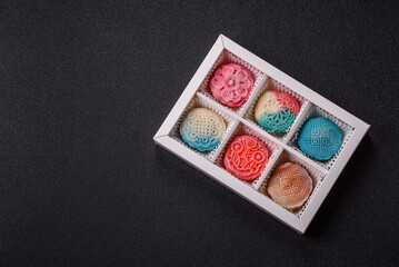 Chinese mooncake is an Asian sweet dessert. Asian mooncake as a background for your design