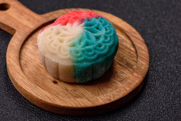 Chinese mooncake is an Asian sweet dessert. Asian mooncake as a background for your design