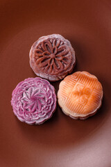 Chinese mooncake is an Asian sweet dessert. Asian mooncake as a background for your design