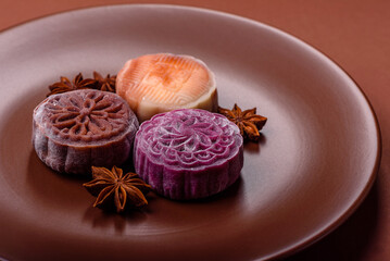 Chinese mooncake is an Asian sweet dessert. Asian mooncake as a background for your design
