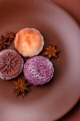 Chinese mooncake is an Asian sweet dessert. Asian mooncake as a background for your design