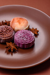 Chinese mooncake is an Asian sweet dessert. Asian mooncake as a background for your design