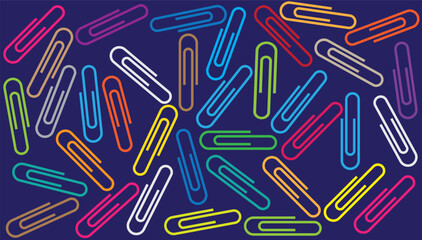 Vibrant collection of colorful paper clips on blue