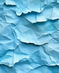 Fototapeta premium Crumpled light-blue paper texture