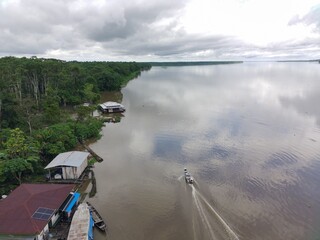 houses in an area flooded by the great flood of 2025 in the Amazon