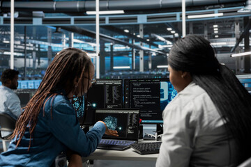 Data center admins using AI visualization tools to setup machine learning systems handling...