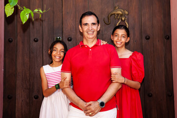 Father and his daughters traveling together.  Family love concept. Travel concept. Cartagena de Indias.