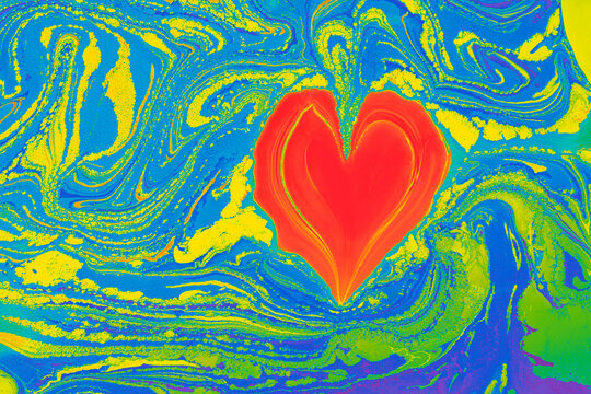 Abstract Ebru marbling effect pattern in the shape of a heart