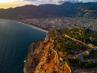 Red Fortress of Alanya at sunset drone view.