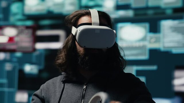 Male spy bypasses network security and engages in cyber intrusion with vr glasses, programming code for data breach and identity theft. Covert cyber operations through infiltration. Camera A.