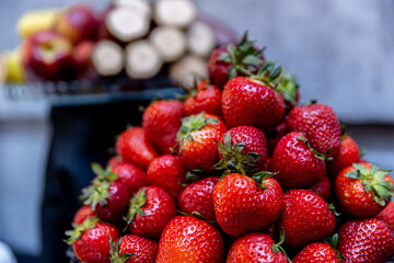 Fresh Strawberries Are Piled High at the Local Market, Ready for Purchase and Enjoyment