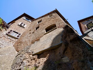 Building corner in the old village at the Barbarano Romano. Viterbo, Lazio region, Italy