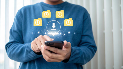 Person using a smartphone to download files from folders in a digital network