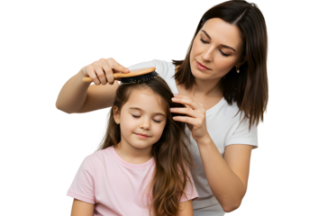 Mother brushes daughter's hair Family bonding time indoors