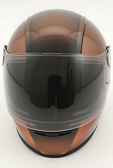 A brown motorcycle helmet with a dark visor on a white background studio shot