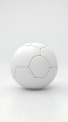 A white soccer ball on a white background in a studio setting with soft light