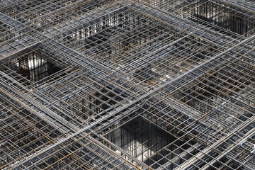 Obraz premium Reinforced concrete framework in progress. Grid of steel bars