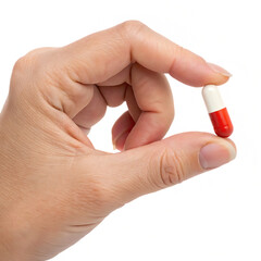 Hand holding single red and white capsule pill isolated on a white background png generated ai