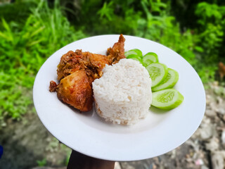 Ayam mbledos is very spicy. Spicy food. Homemade food. Indonesian cuisine