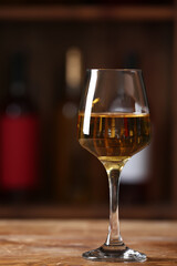 Glass of exquisite wine on table