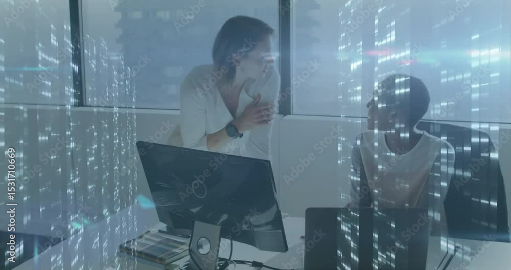 Poster Office manager tapping monitor to clarify data while colleague smiling with flickering city lights