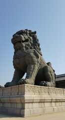 Obraz premium Majestic Stone Lion Guardian at Gyeongbokgung Palace Seoul South Korea