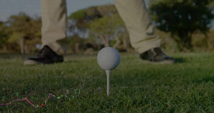 Downswing starting showing data graph overlay as golfer swinging driver striking ball for analytics - Powered by Adobe