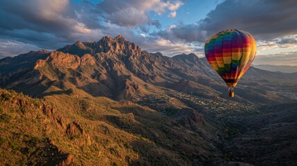 Fototapeta premium Experience hot air balloon rides for panoramic vistas and serene, unforgettable journeys high above the ground. 