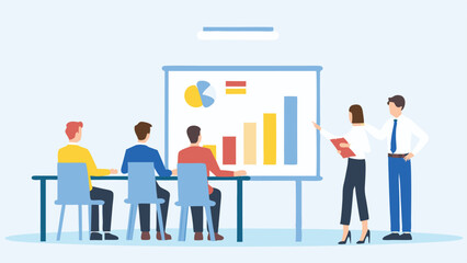 People in a meeting room looking at a presentation with charts and graphs on a whiteboard display