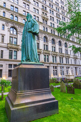 An outdoor bronze sculpture depicting U.S. Congressman John Watts is located in the Trinity Church Cemetery. NYC, New York State, United States of America, 31 May 2024. 