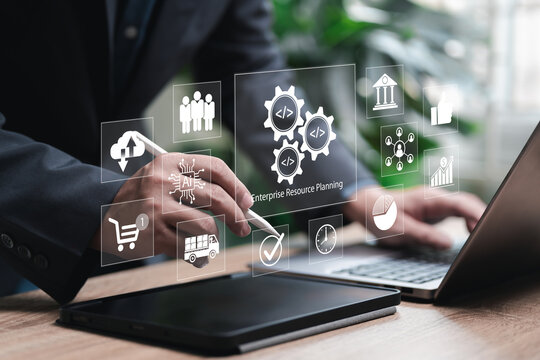 ERP, Enterprise resource planning concept. Businessman use software applications help organisations manage business processes, finance, human resources, supply chain, Customer relationship management