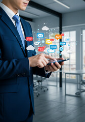 Modern Business Communication: A sophisticated businessman in a tailored suit is immersed in the world of digital connectivity, managing a complex network of communications through his mobile device.
