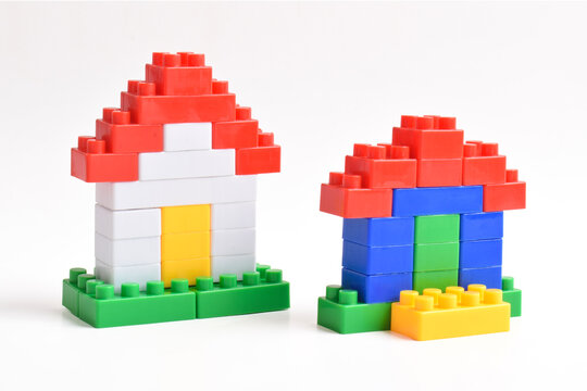Lego house isolated on white background. Plastic building blocks