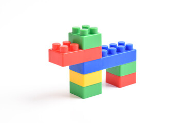 Plastic building blocks dog on a white background