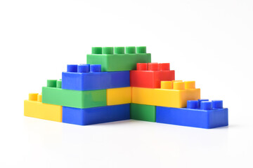 Plastic building blocks isolated on white background