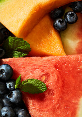 Fresh Summer Fruit Close-Up with Mint Leaves