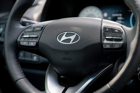 Nova Bana, Slovakia - June, 1, 2025 : Hyundai i30 interior, steering wheel, center console, cockpit, dashboard. Hyundai logo close up.