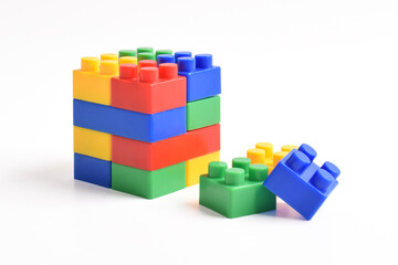 Obraz premium Plastic building blocks isolated on white background