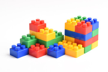Fototapeta premium Plastic building blocks isolated on white background