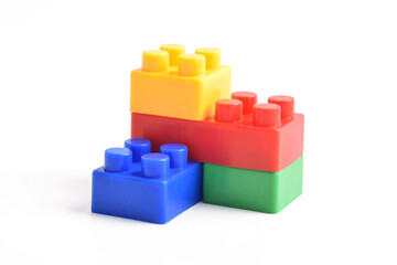 Obraz premium Plastic building blocks isolated on white background