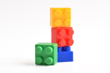 Colorful Plastic toy blocks isolated on white background. Building Blocks © Mulad Images