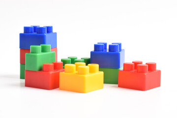 Colorful Plastic toy blocks isolated on white background. Building Blocks © Mulad Images