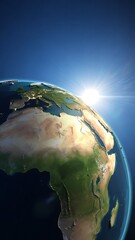A view of earth from space showing africa europe and the middle east with a bright sun shining above