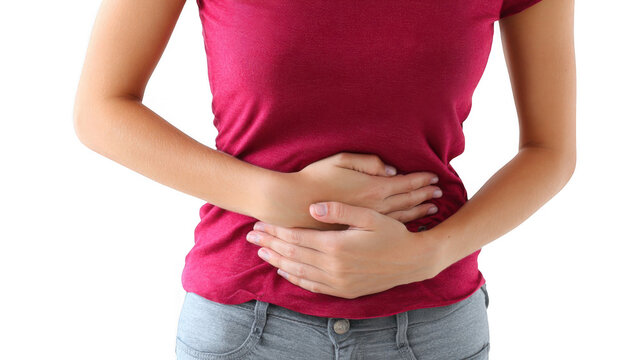 Young woman gripping her lower abdomen while experiencing intense period pain, set against a transparent background. Struggling with discomfort associated with menstruation - Powered by Adobe
