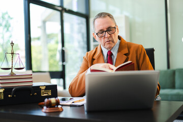 Male judge in courtroom, lawyer working in office. Perfect for business, legal advice, corporate law