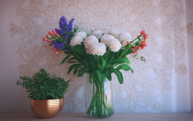 Bouquet of white flowers in glass vase