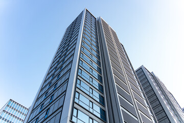 Obraz premium Low angle view of modern skyscrapers against sky