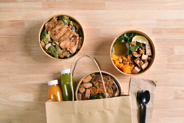 Having a lunch break at the office with delicious Healthy food delivery in take away boxes, Healthy eating concept.