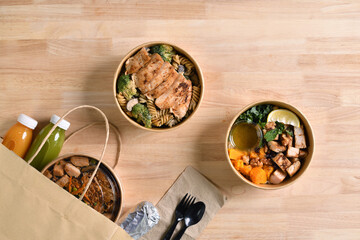 Having a lunch break at the office with delicious Healthy food delivery in take away boxes, Healthy eating concept.