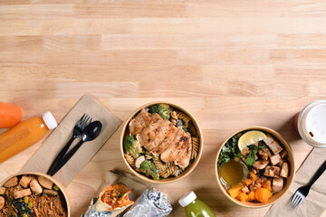 Having a lunch break at the office with delicious Healthy food delivery in take away boxes, Healthy eating concept.